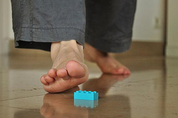 Stepping on lego